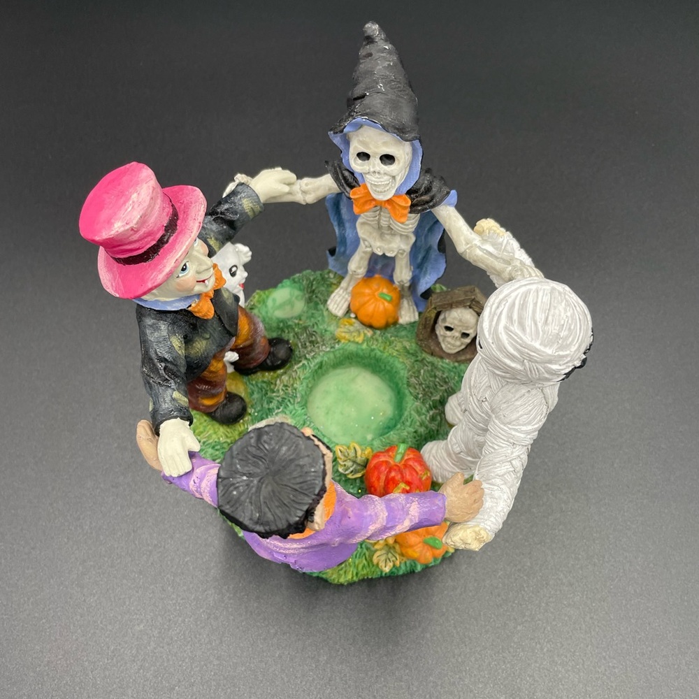 Halloween 5”w x  4”h Holding Hands Resin Circular Candle